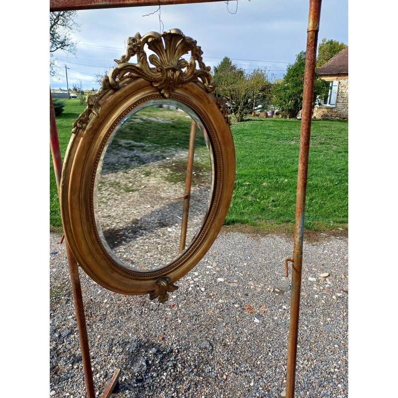 Miroir ovale en bois et stuc doré 19ème