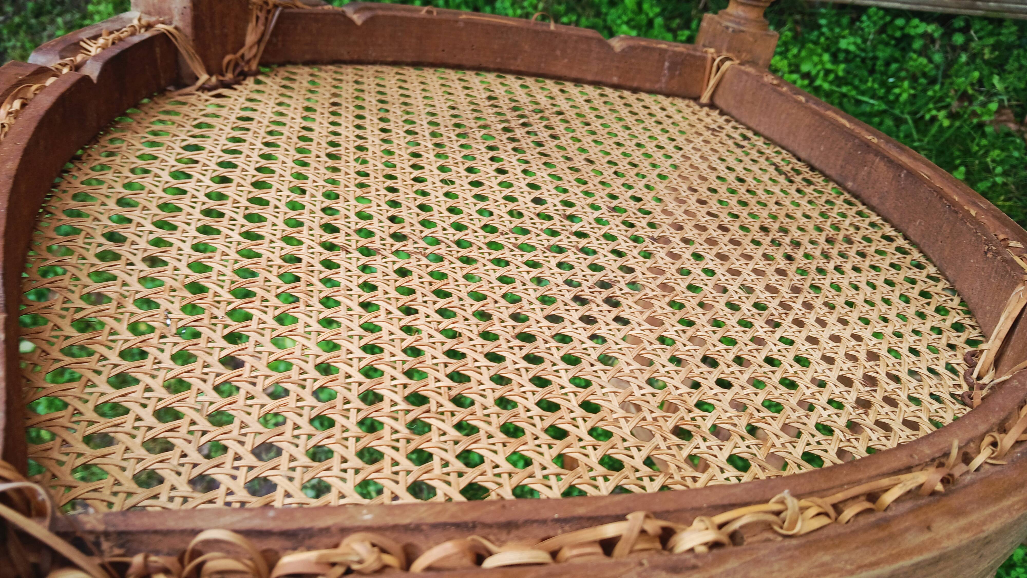 Corner chair in beech, caned seat from the early 20th century.