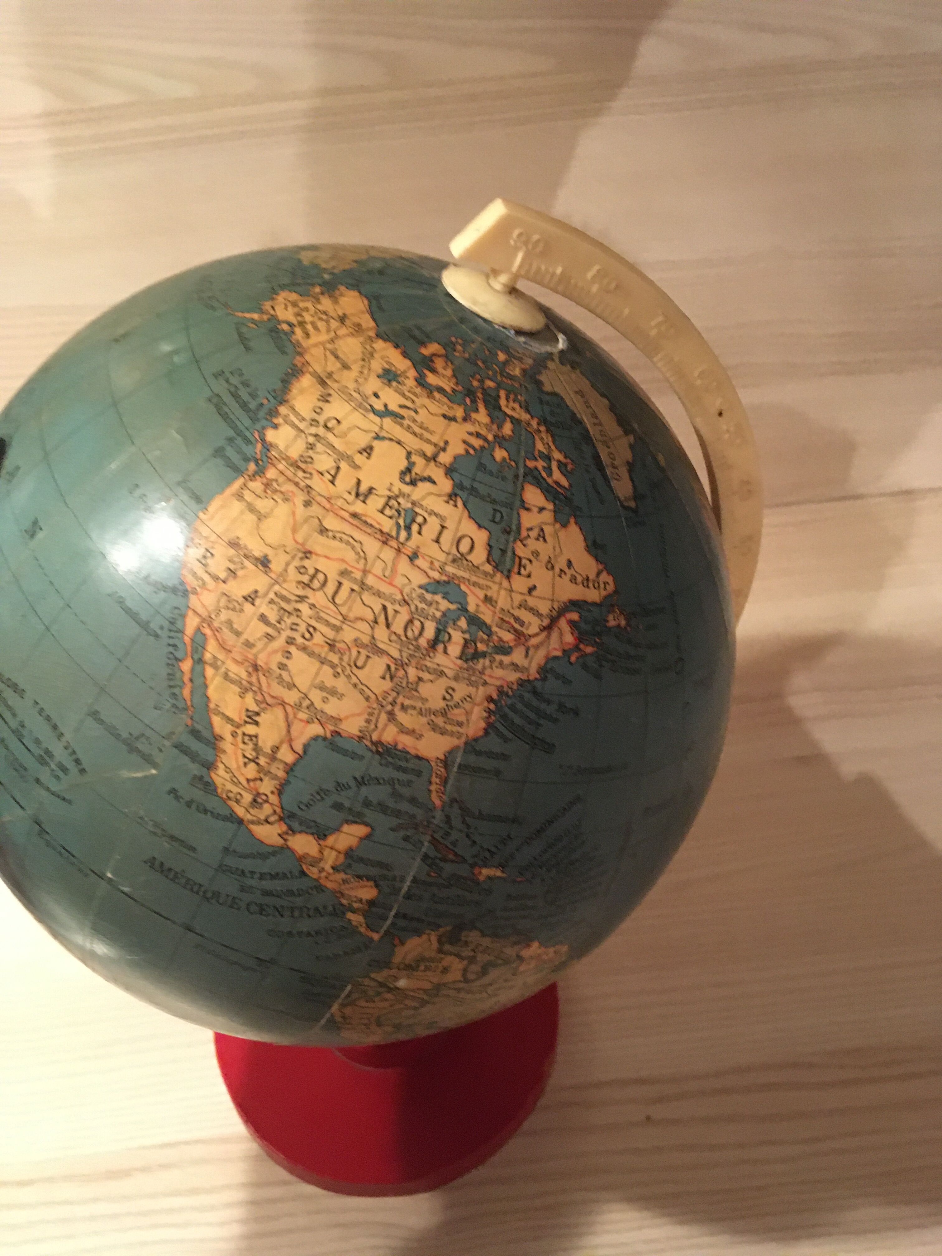 Earth globe ancient wooden foot