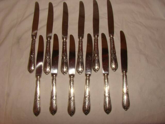 12 stainless steel table knives M.A. in "Louis XV" style, hunting horn model.
