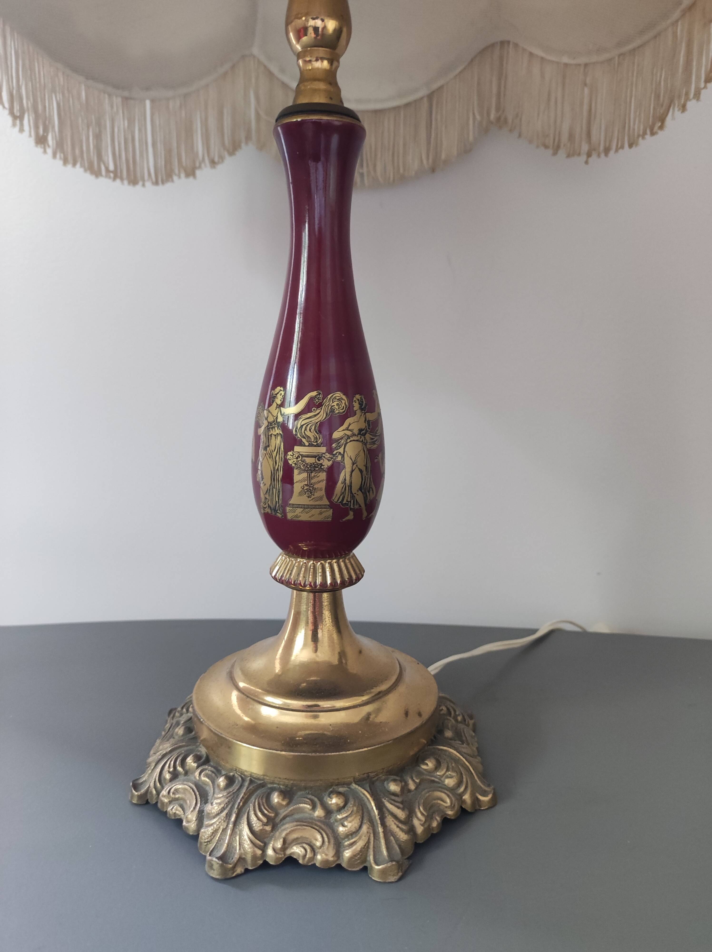 Chiseled bronze foot lamp