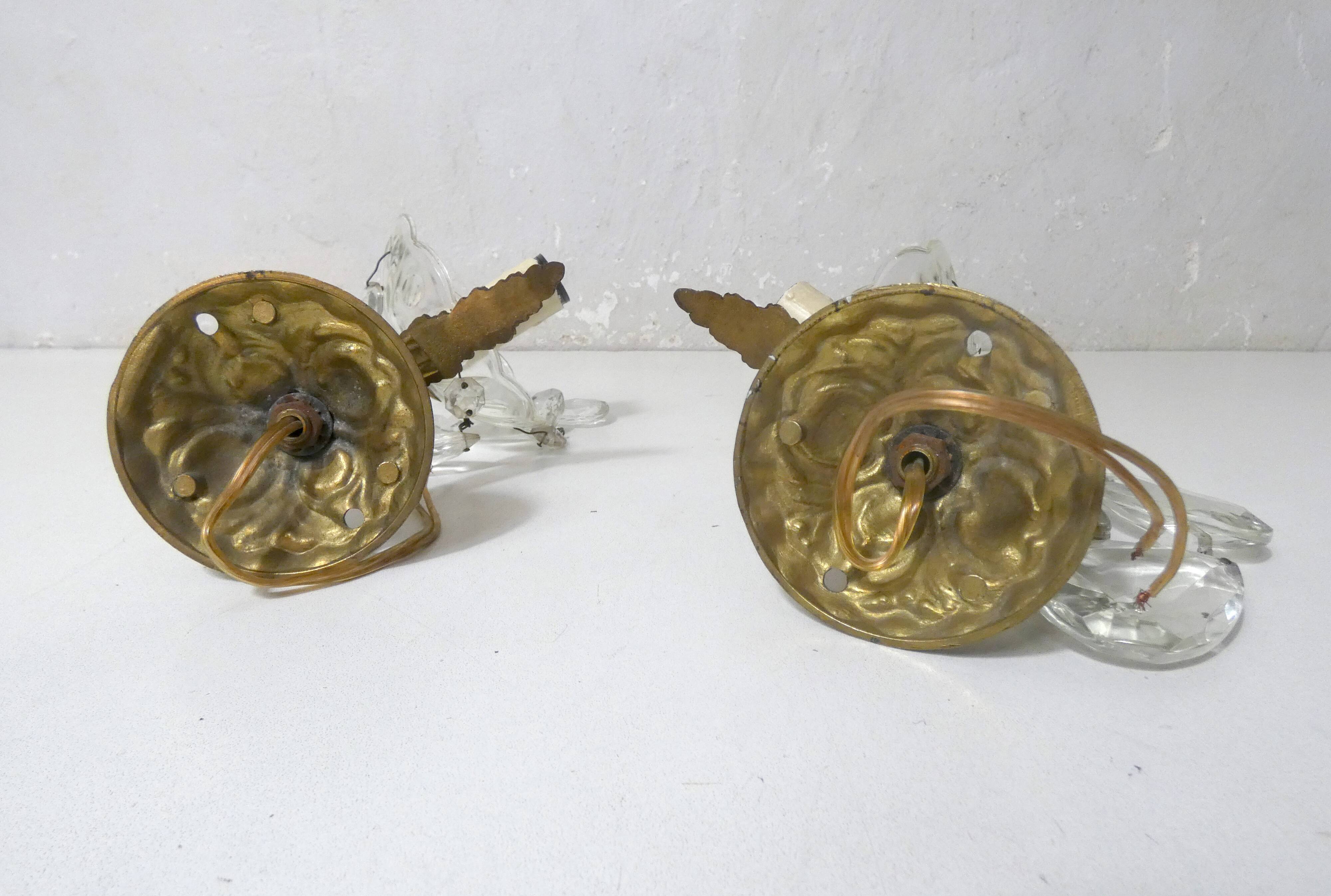 Paire d'appliques en bronze doré et pampilles