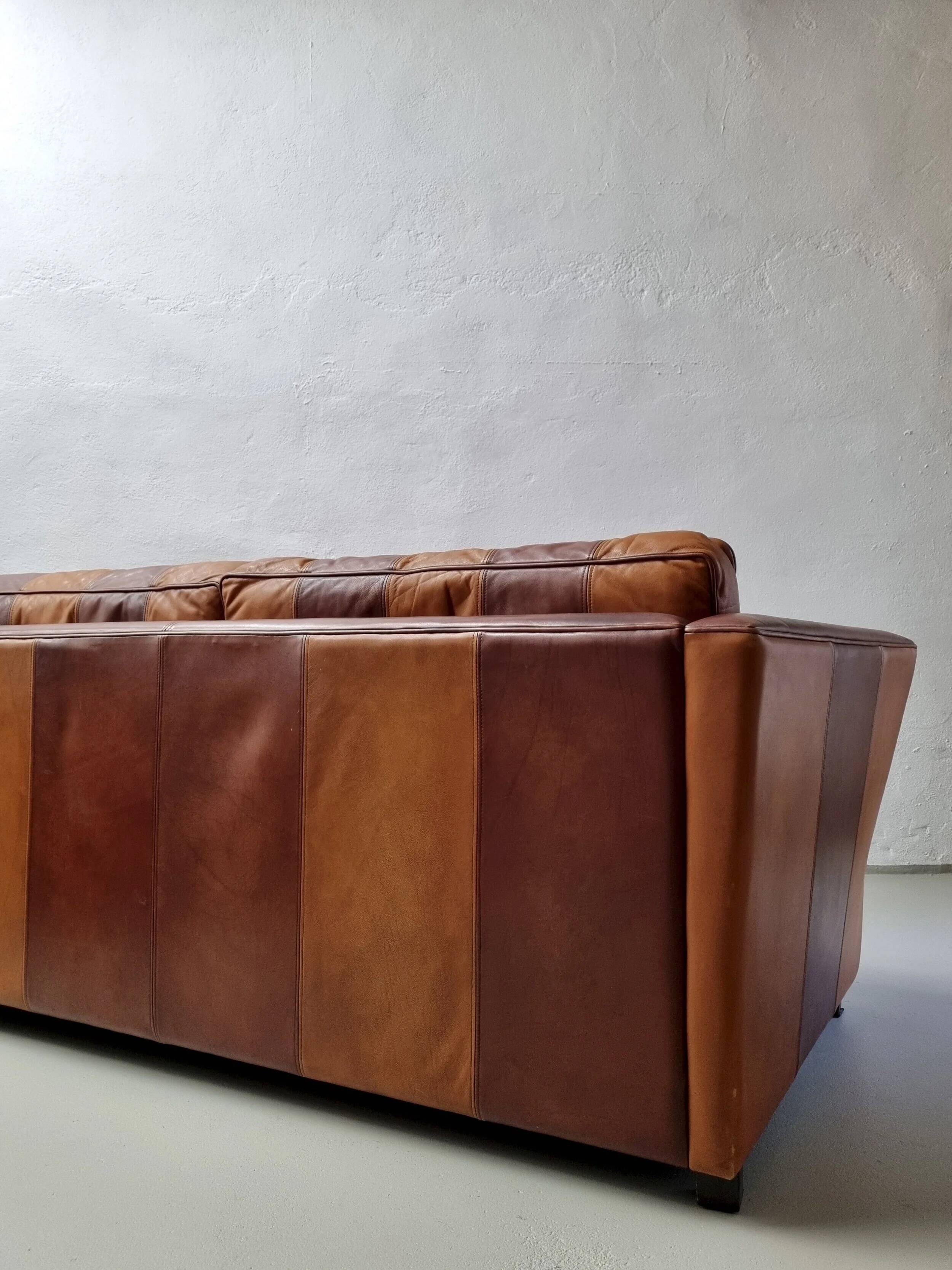 Vintage striped brown orange leather sofa (210 cm x 88 cm)