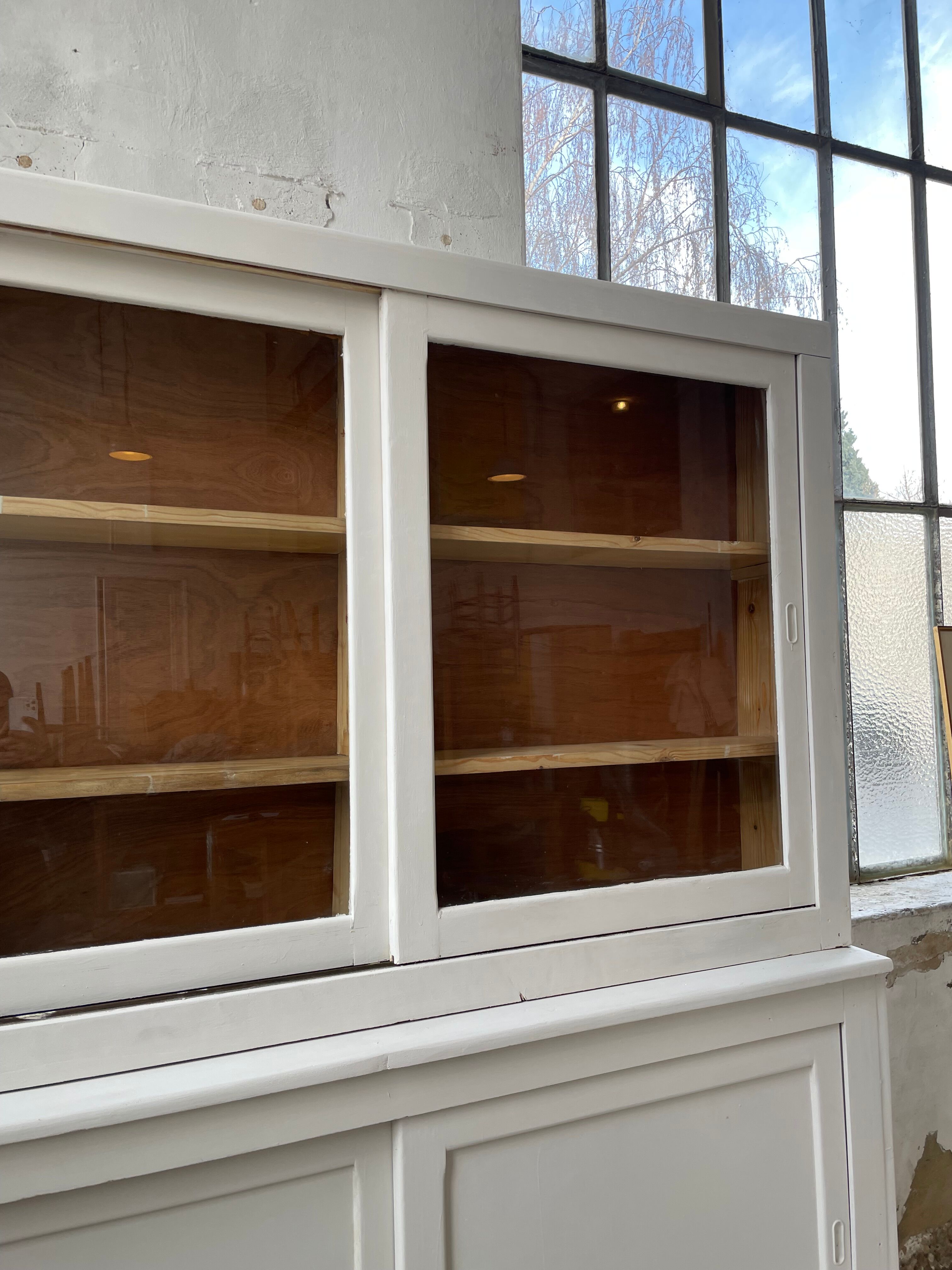 Library showcase ivory white sliding doors