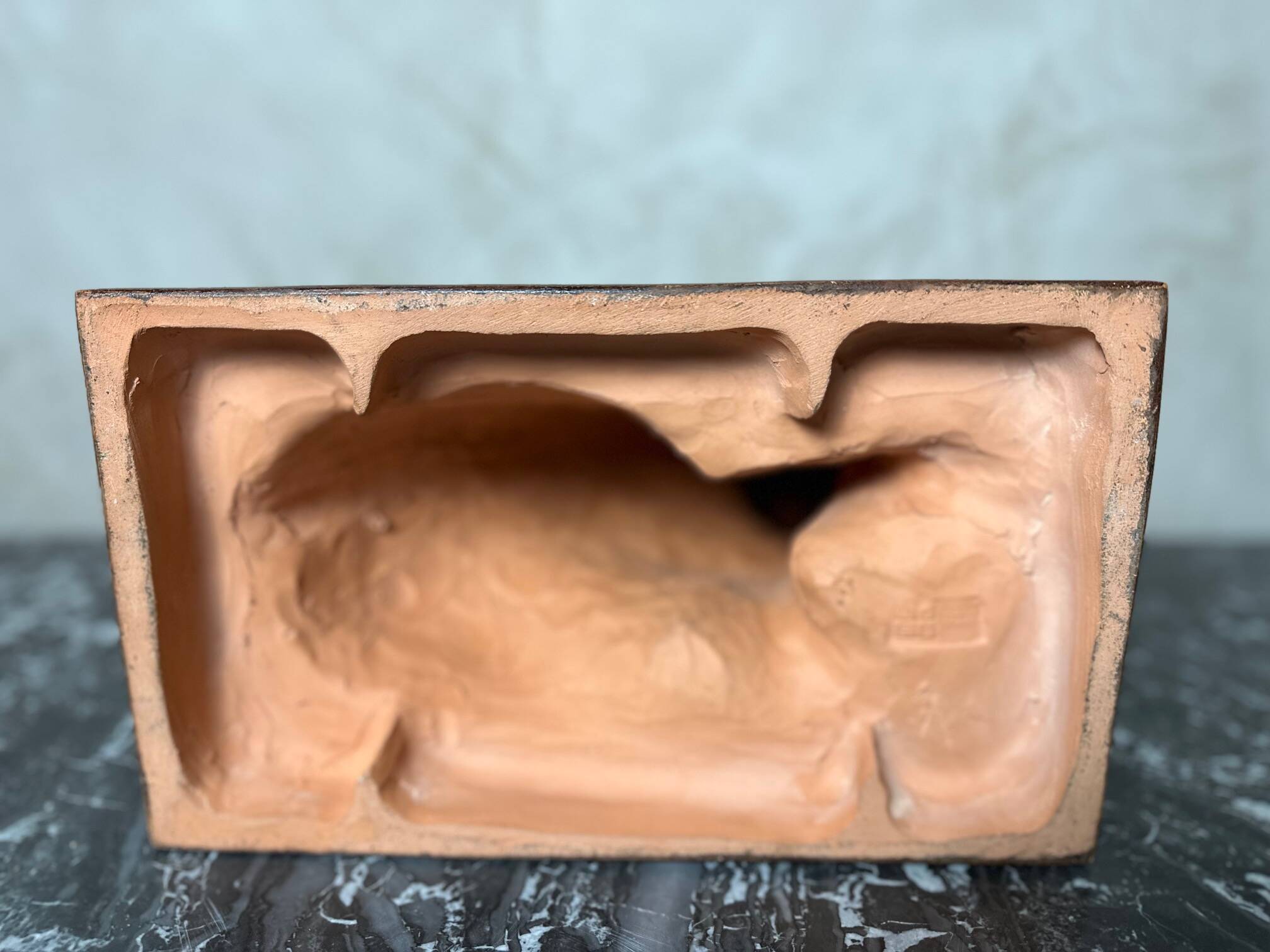 Terracotta dog signed R. Pollin