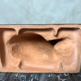 Terracotta dog signed R. Pollin