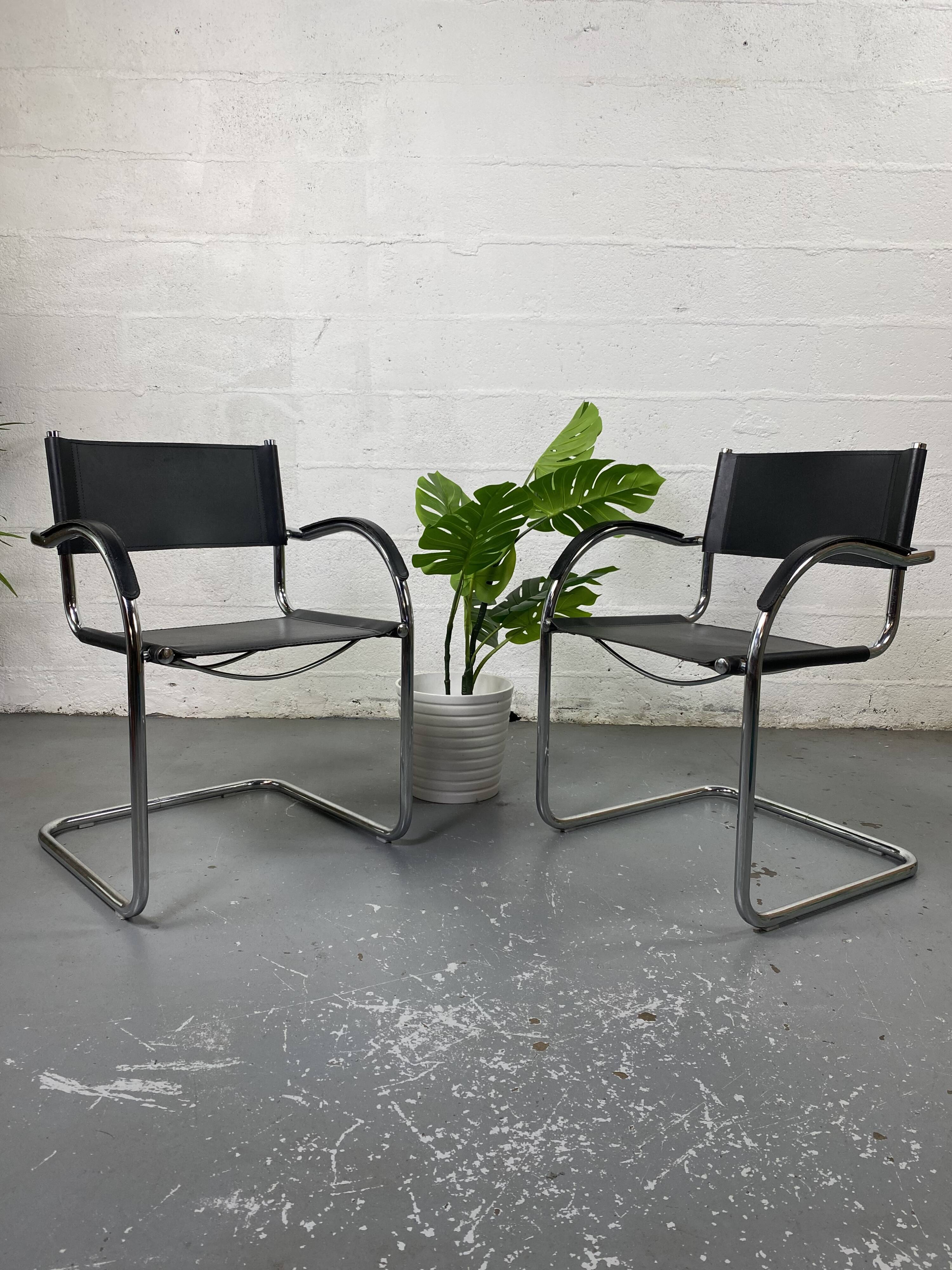 Pair of design armchairs in imitation leather chrome