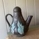 Enamelled terracotta teapot signed Keka