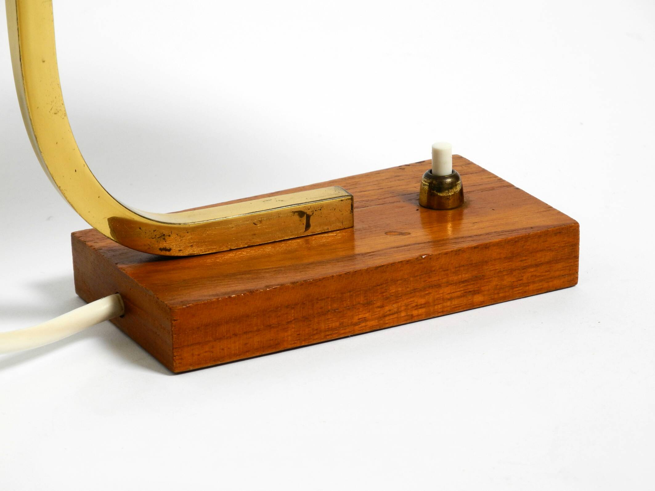 Beautiful small Mid Century Modern metal and brass table lamp with teak bas