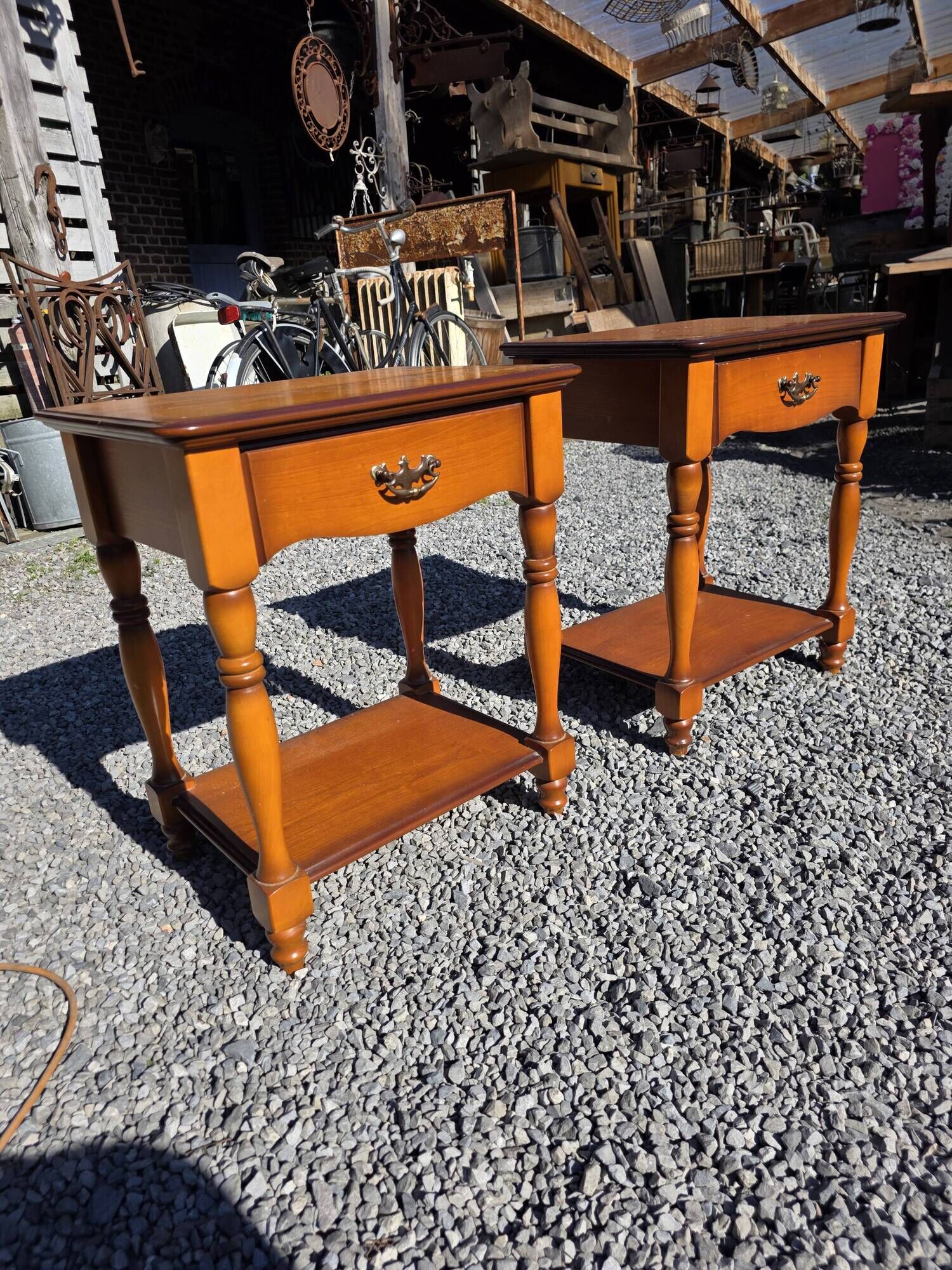 Pair of cherry wood bedside tables from the mid-20th century.
