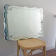 Old chiseled mirror