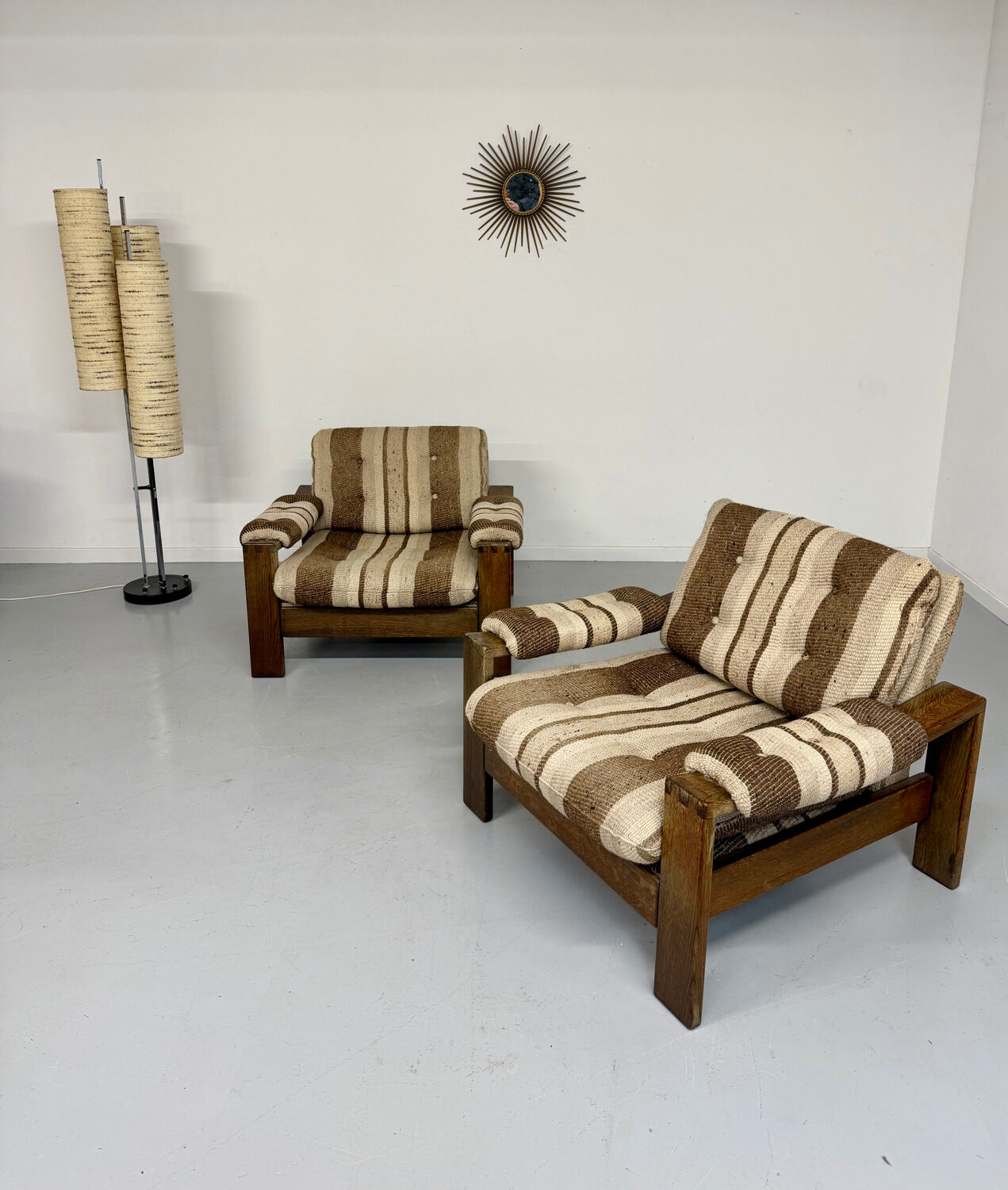 2 vintage 1970s wooden and fabric armchairs