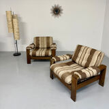 2 vintage 1970s wooden and fabric armchairs