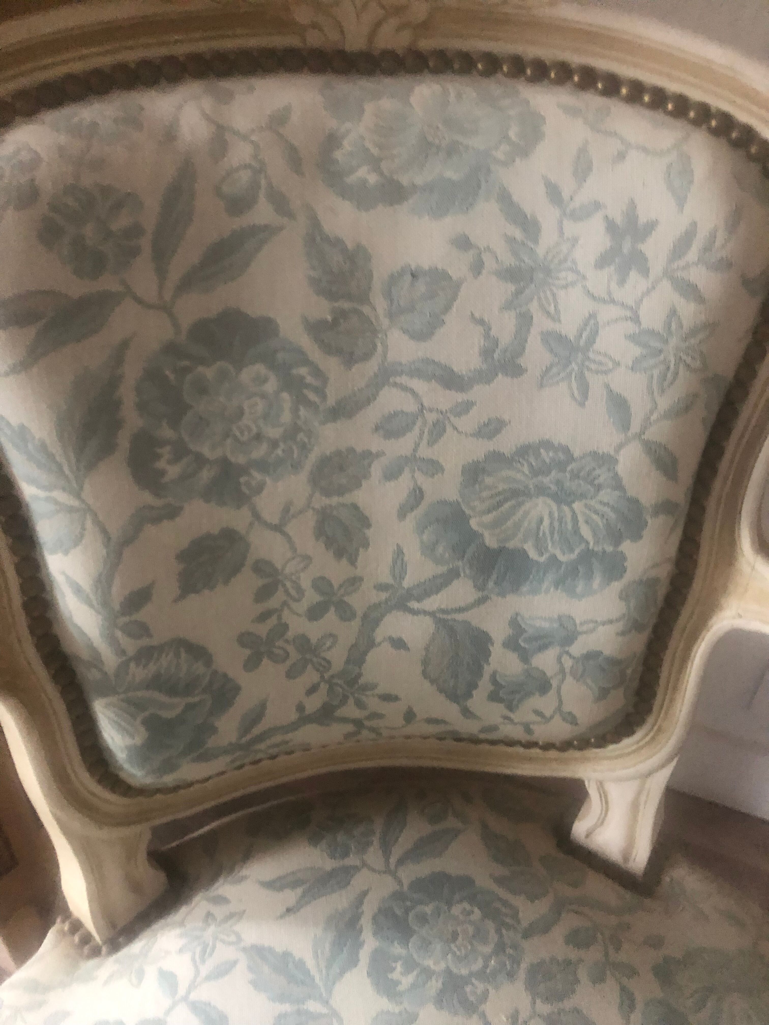 Armchair and its footrest Louis XV style