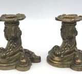 Pair of gilded bronze candlesticks with twisted decor and floral garlands, louis xv style