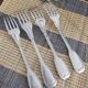 Set of 4 decorative forks with a rim