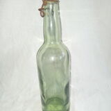 Set of three old bottles of green moulded glass