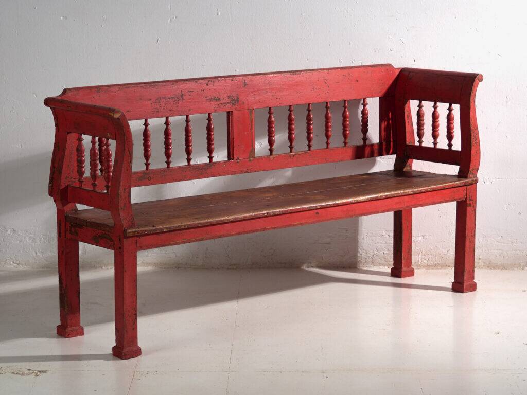 Old red-painted pine bench with turned backrest – Central Europe, circa 1900