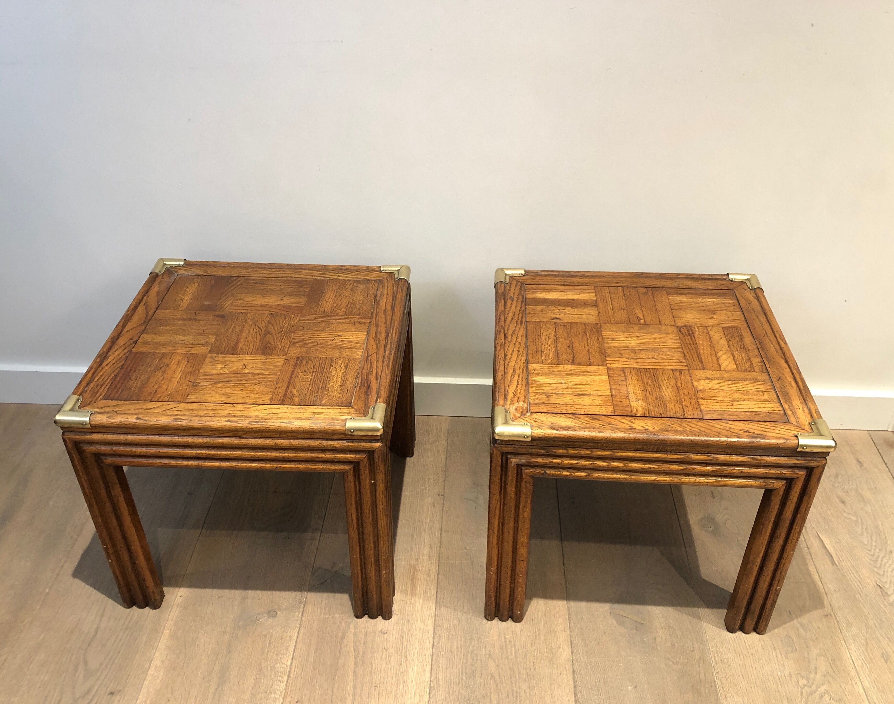 Pair of wooden and brass sofa ends