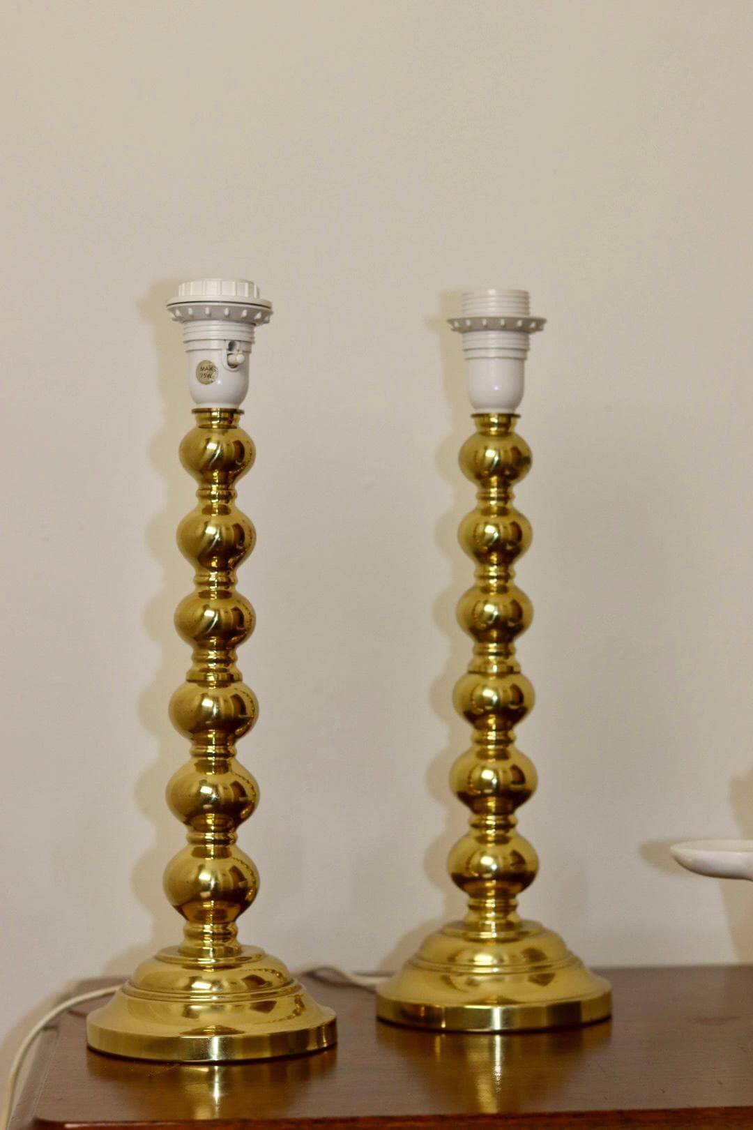 Pair of Swedish brass lamps from the mid-century.