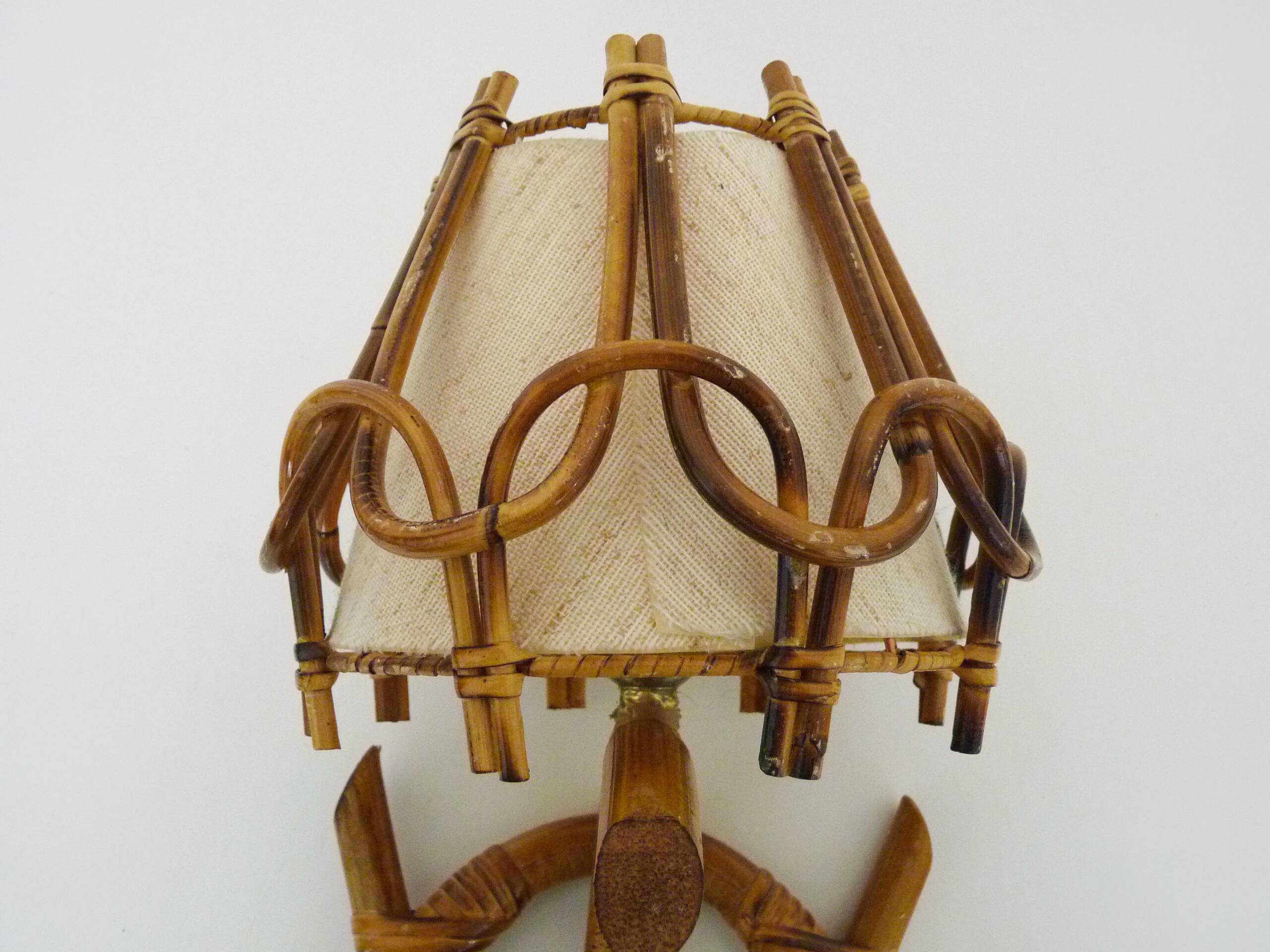 Louis Sognot rattan and bamboo wall light. 1950s
