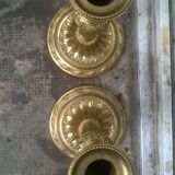 Paire de bougeoirs en bronze doré