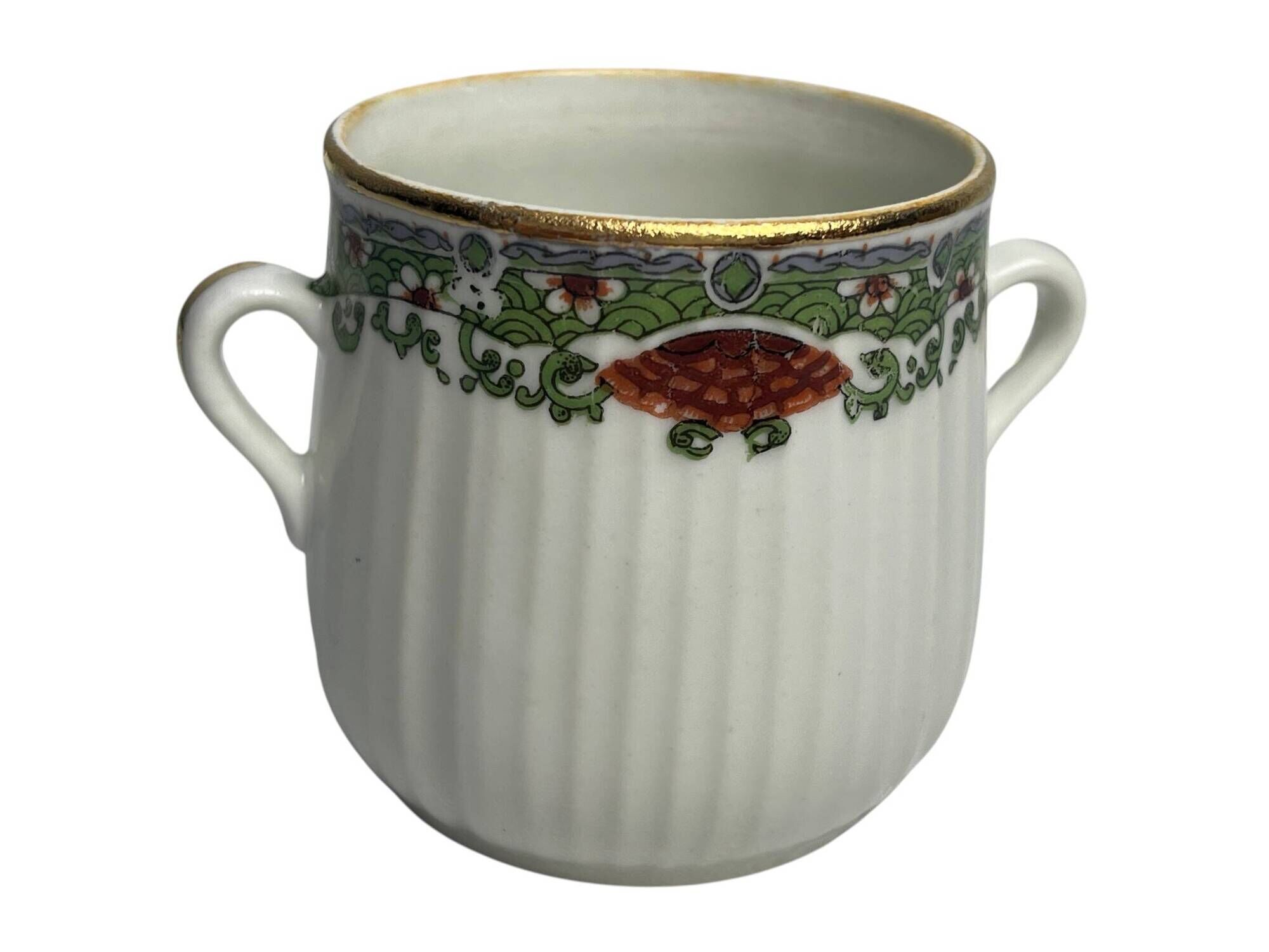 Set of three ribbed porcelain cream pots, 20th century.