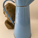 Blue watering can