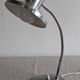 Articulated bedside lamp or wall light in aluminium, France circa 1960.