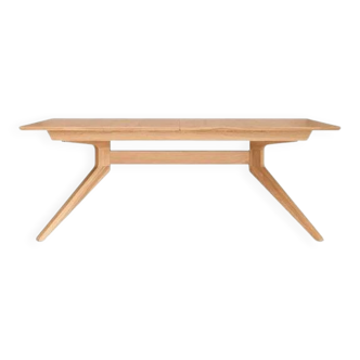 Wooden dining table with a cross extension.