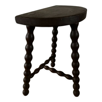 Wooden tripod farm stool