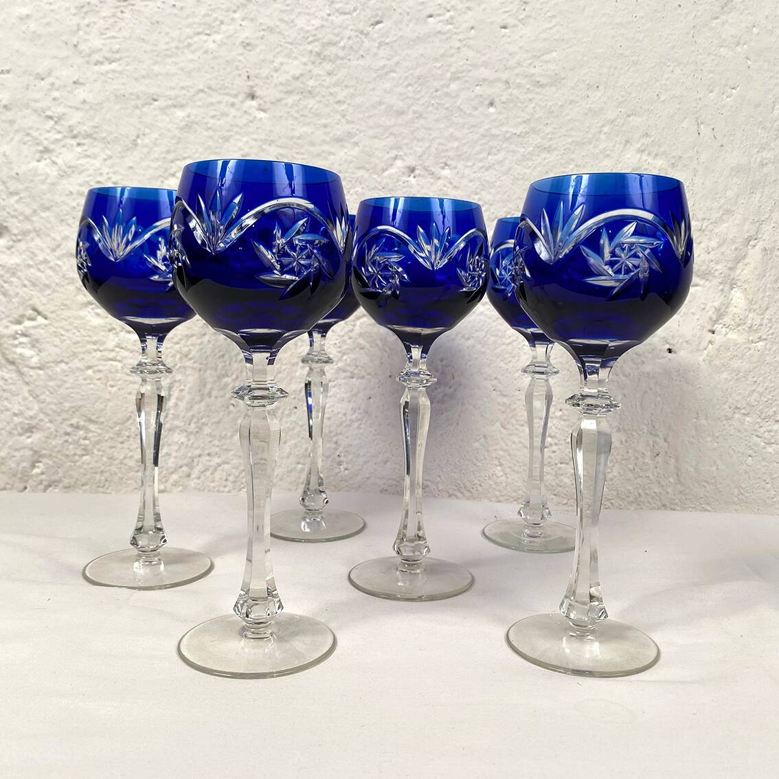 Bohemia. Series of six cut crystal wine glasses from the Rhine in blue.