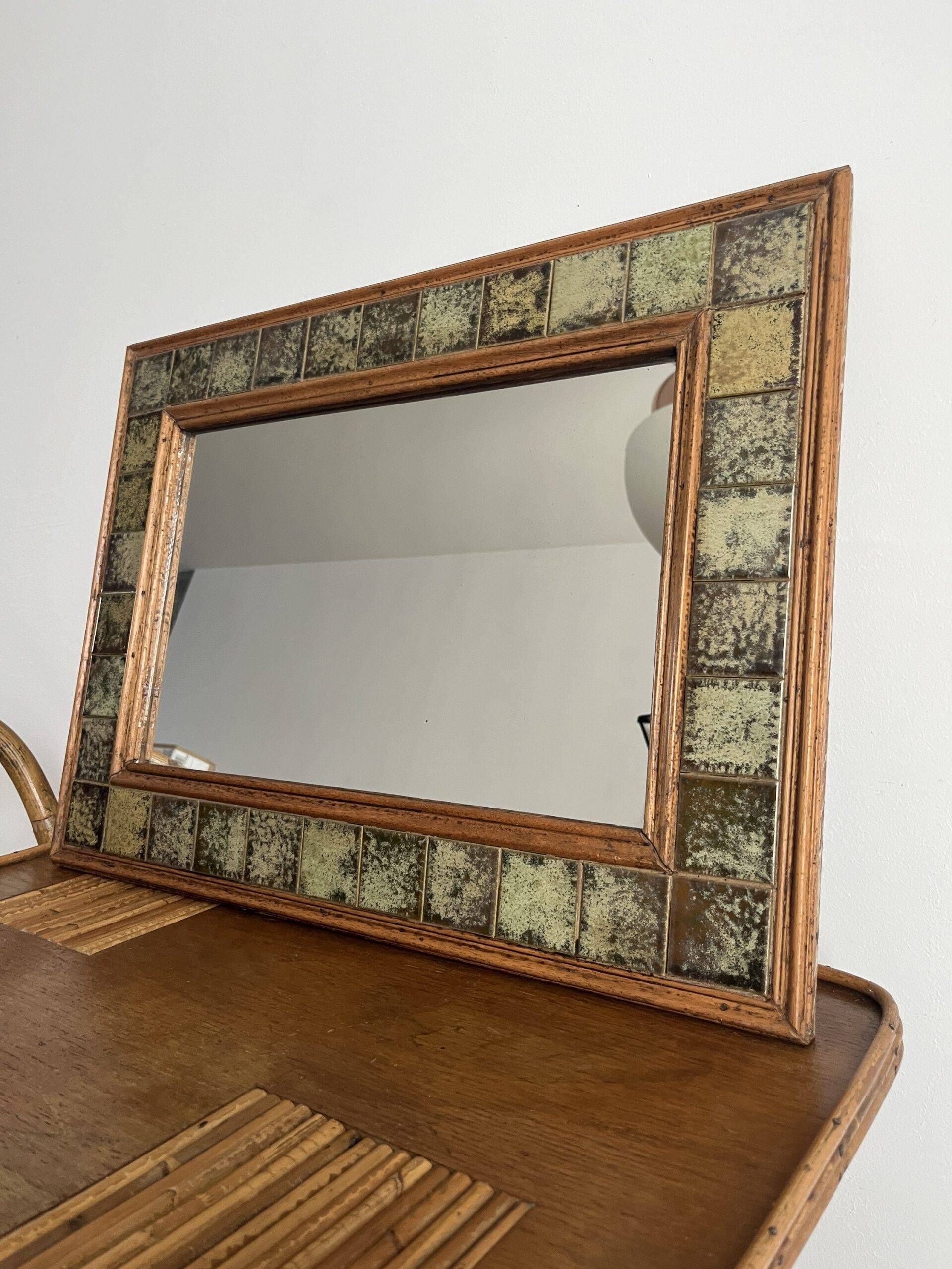 Vintage wall mirror in wood and ceramic tiles