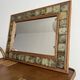 Vintage wall mirror in wood and ceramic tiles