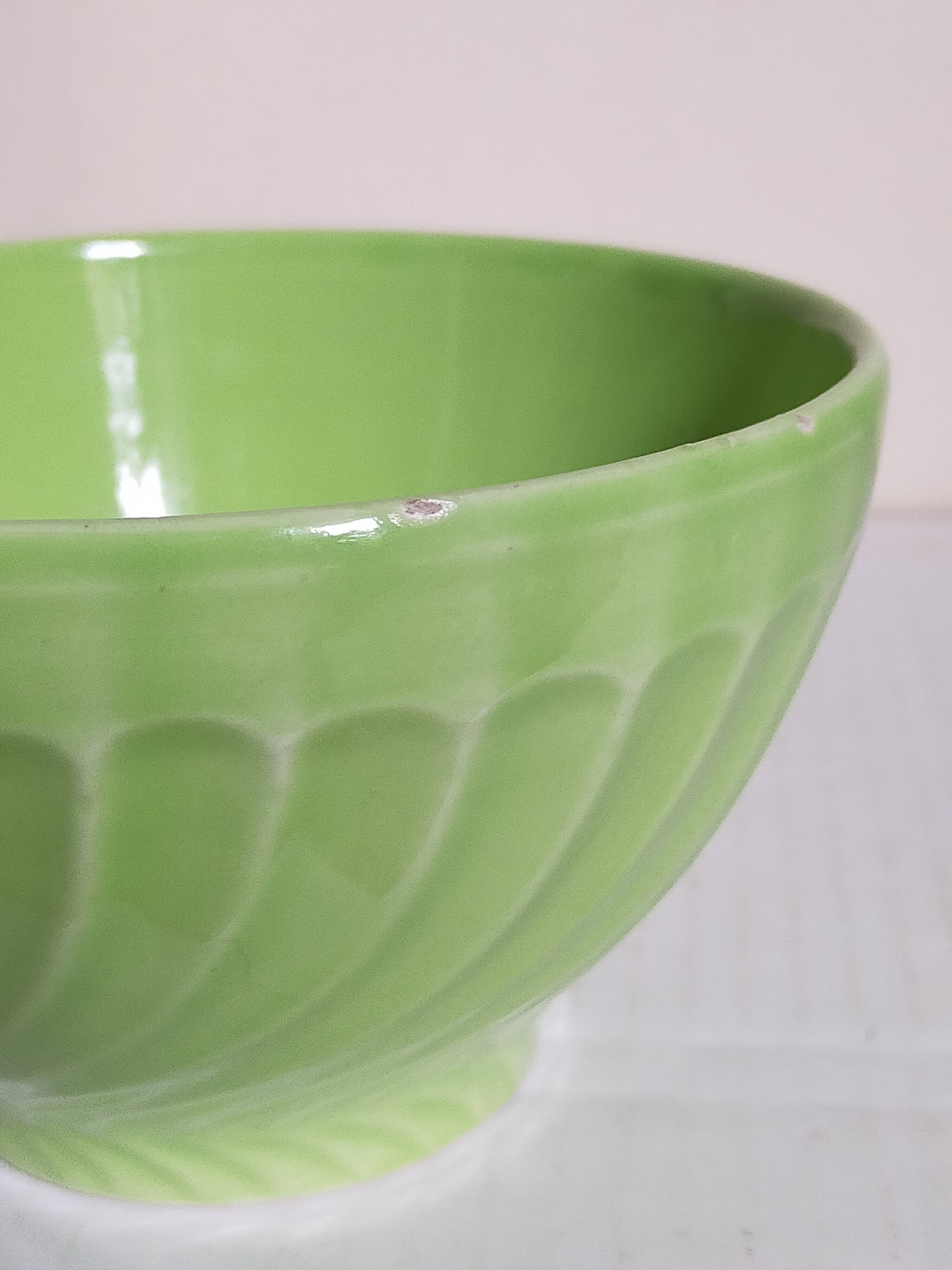 Four vintage spring green earthenware bowls