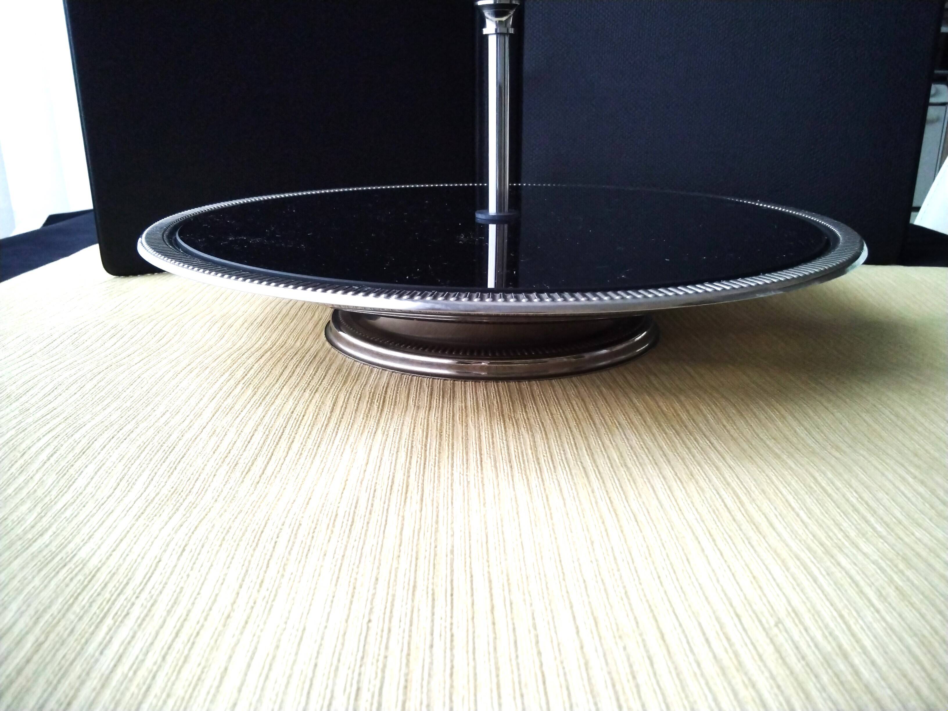 Cheese tray on shower stand in stainless steel and black tinted glass