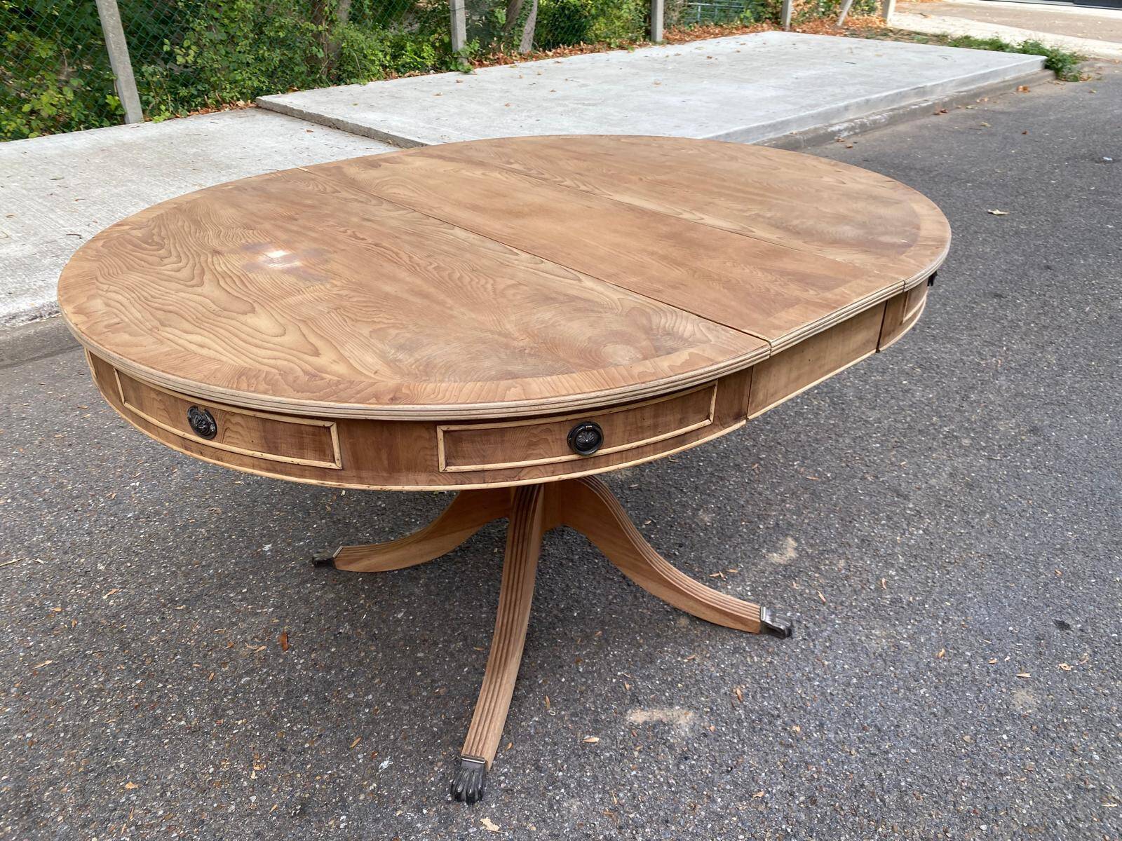 Round extendable dining table Regency central leg stripped mahogany 1960