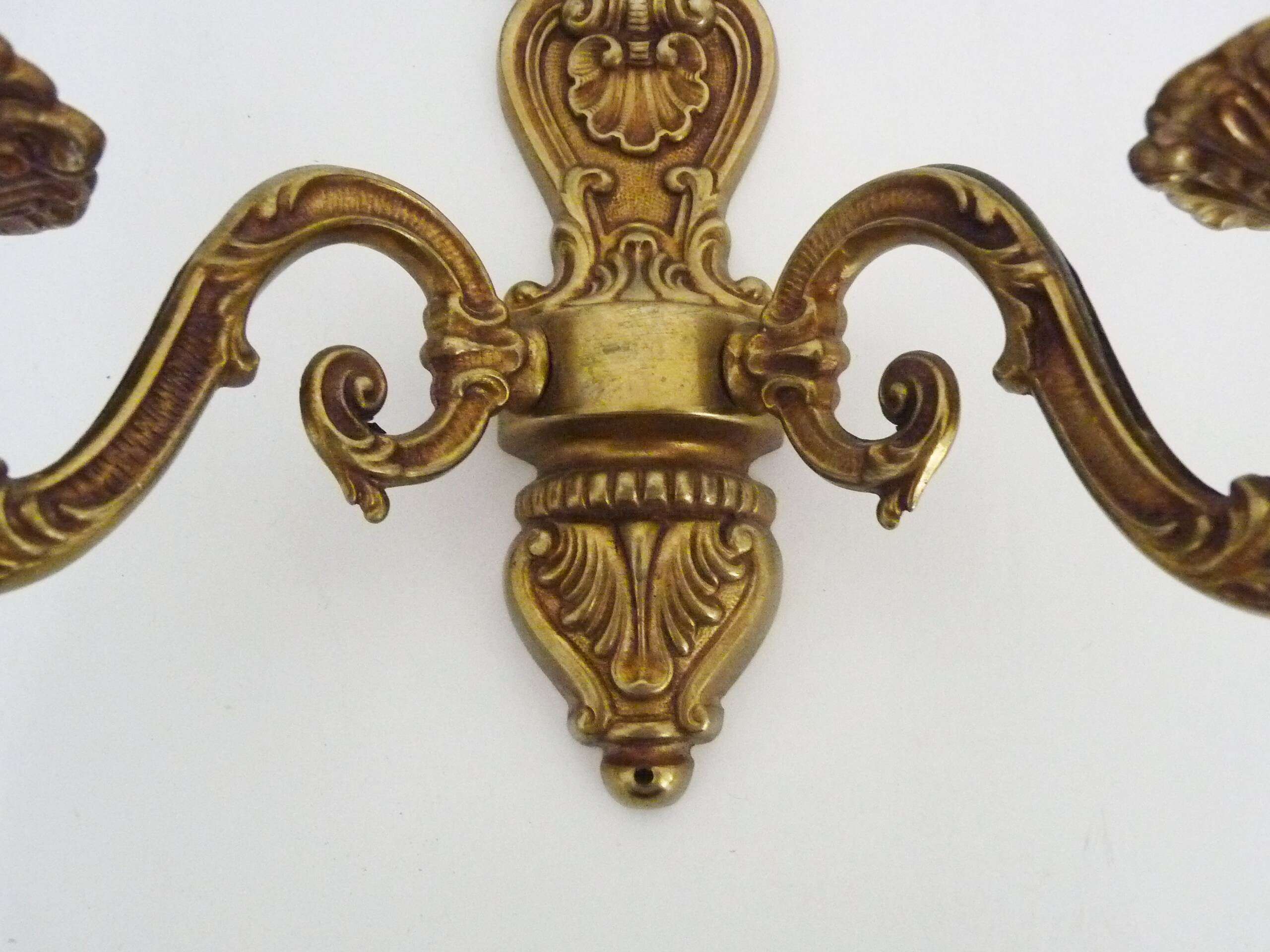 Old pair of double-light brass wall sconces. 60s