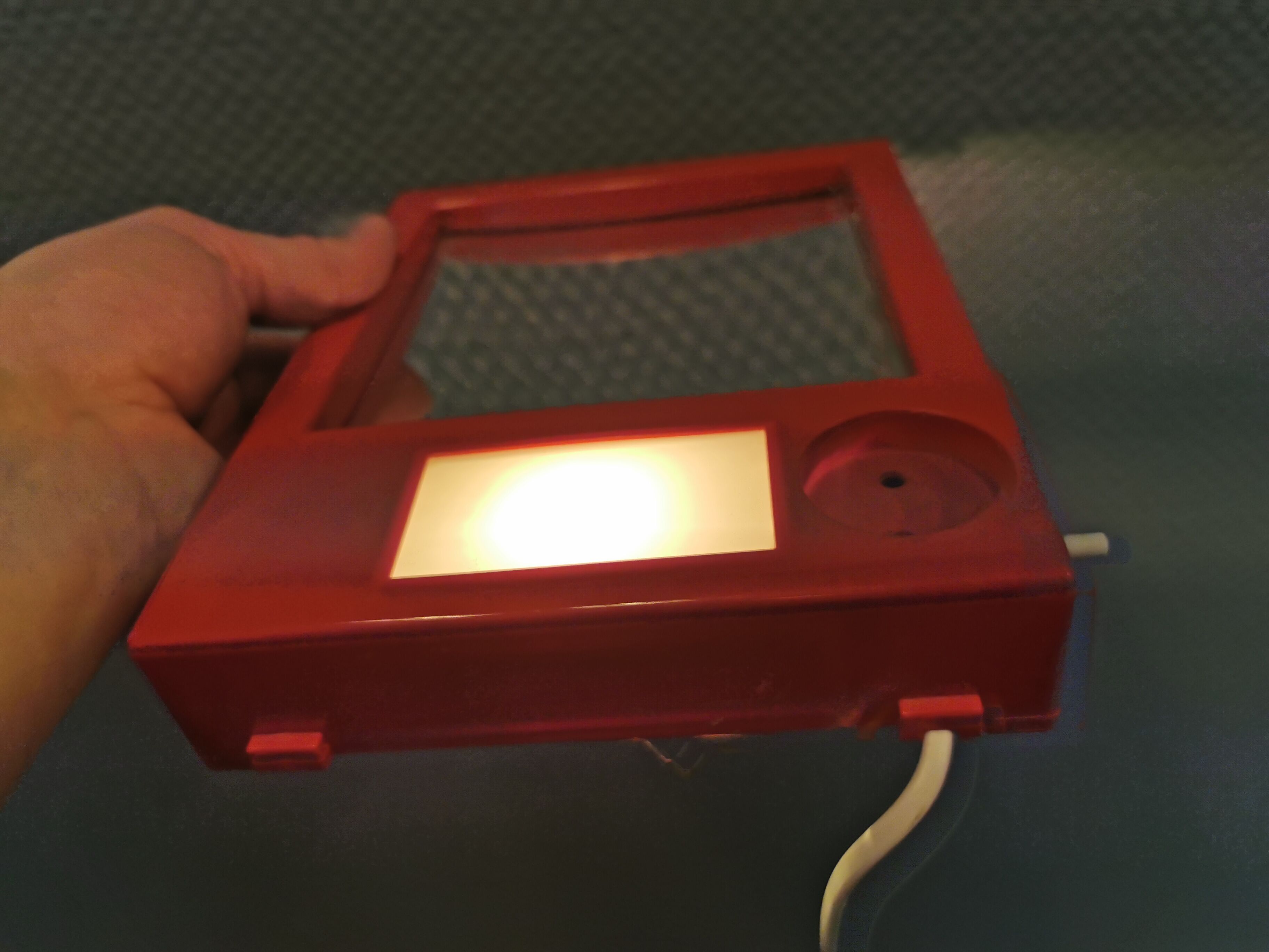 Red danish make up mirror with light and power plug from the 1970