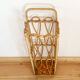 Porte-parapluie vintage en rotin