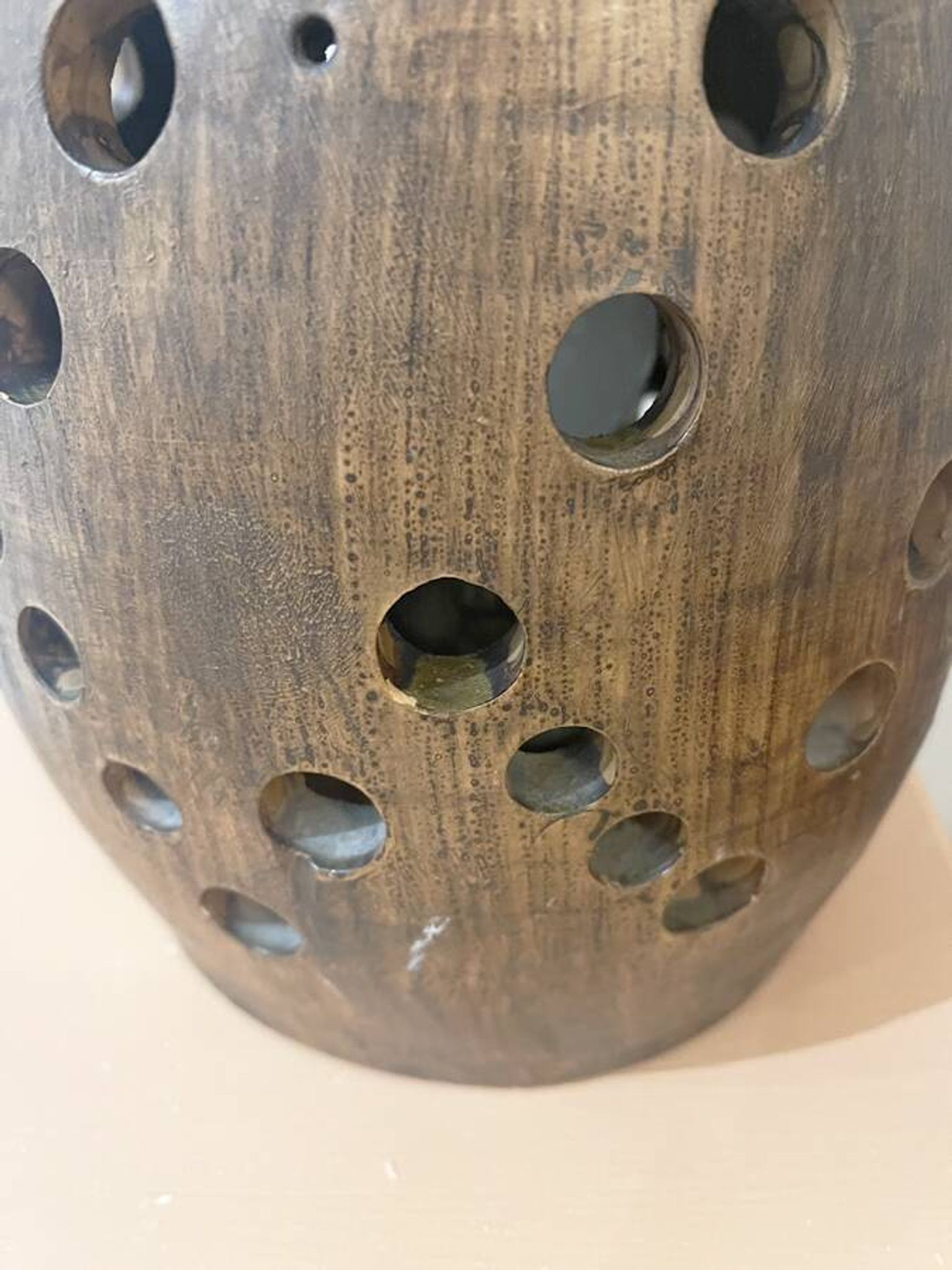 Terracotta lamp with cut-outs, circa 1970.