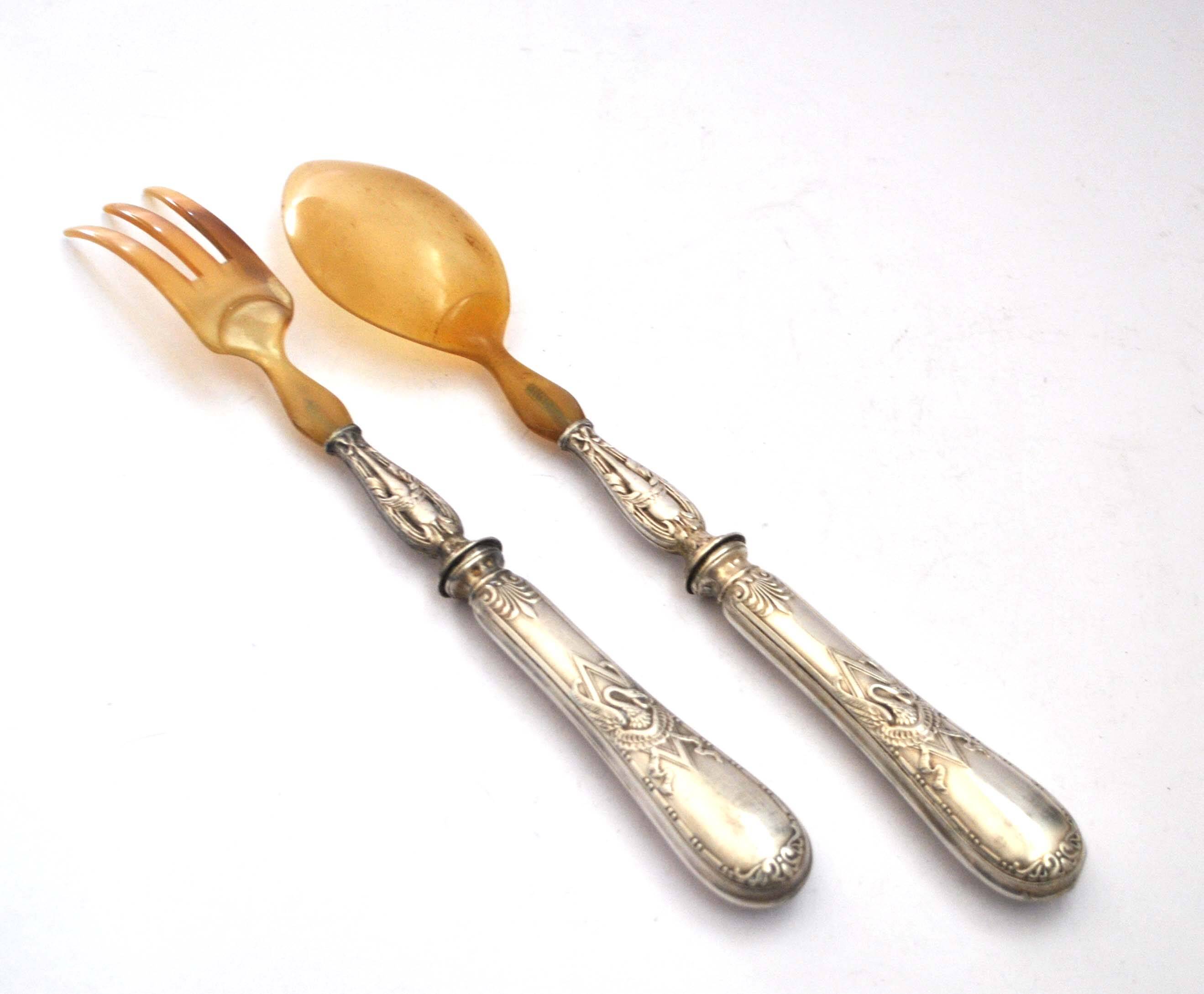 Empire salad server decorated with a swan and napoleon palmette, 19th century.