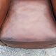 Paire de fauteuils club en cuir brun des années 30