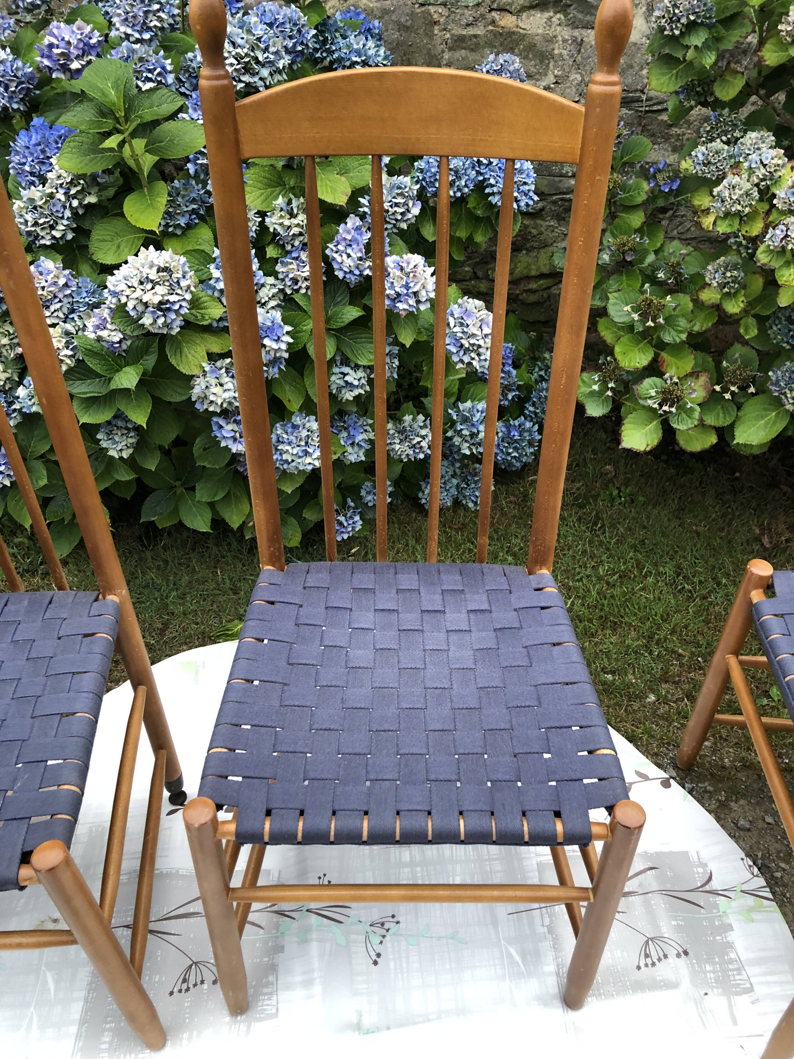 4 vintage Roche Bobois chairs from the 80s in beech with woven seats in blue fabric.