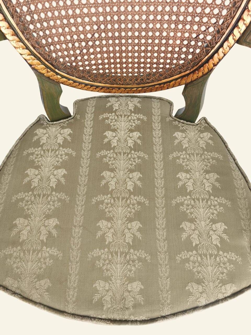 Pair of Louis XVI style armchairs, oval backrest and caning.