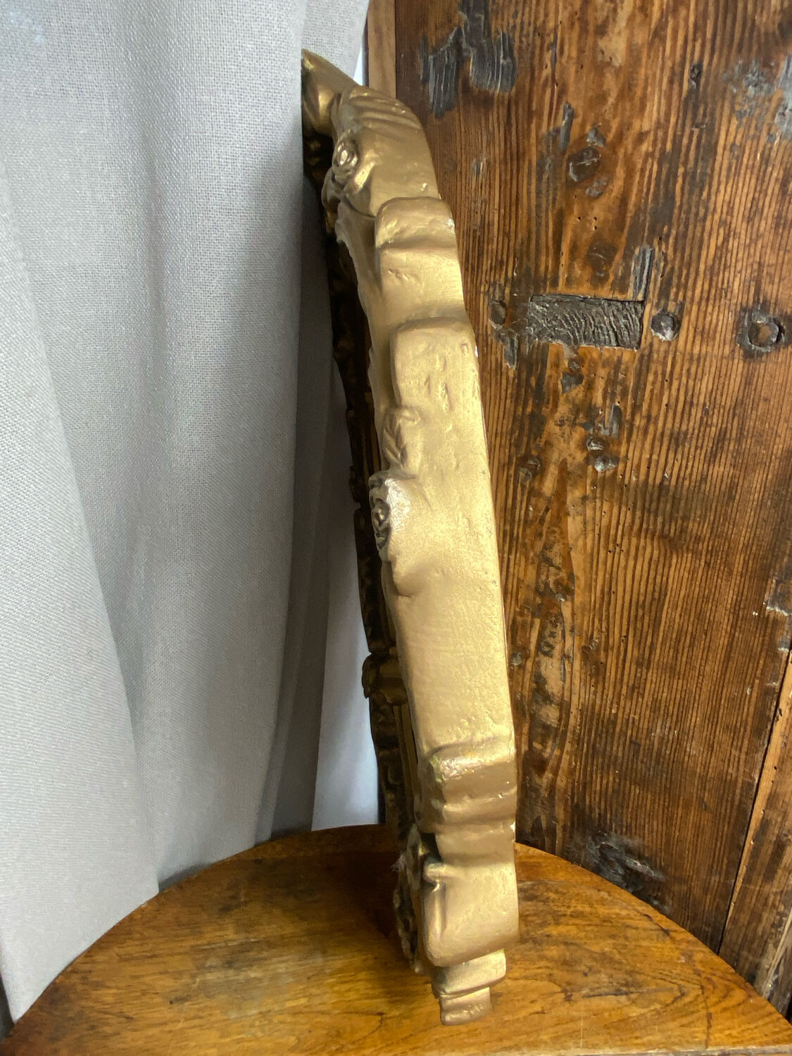 Rococo style mirror in wood and gilded stucco