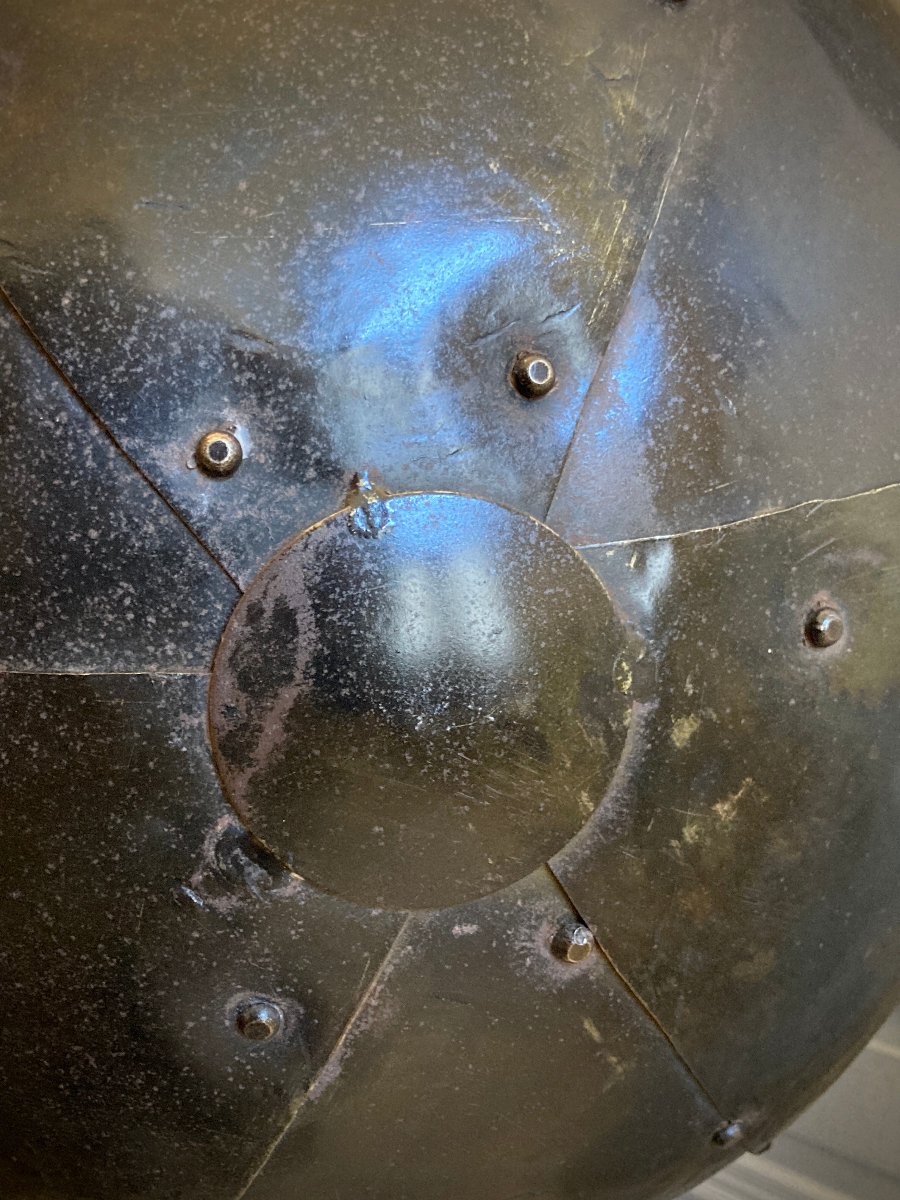 Atypical industrial furniture riveted sphere