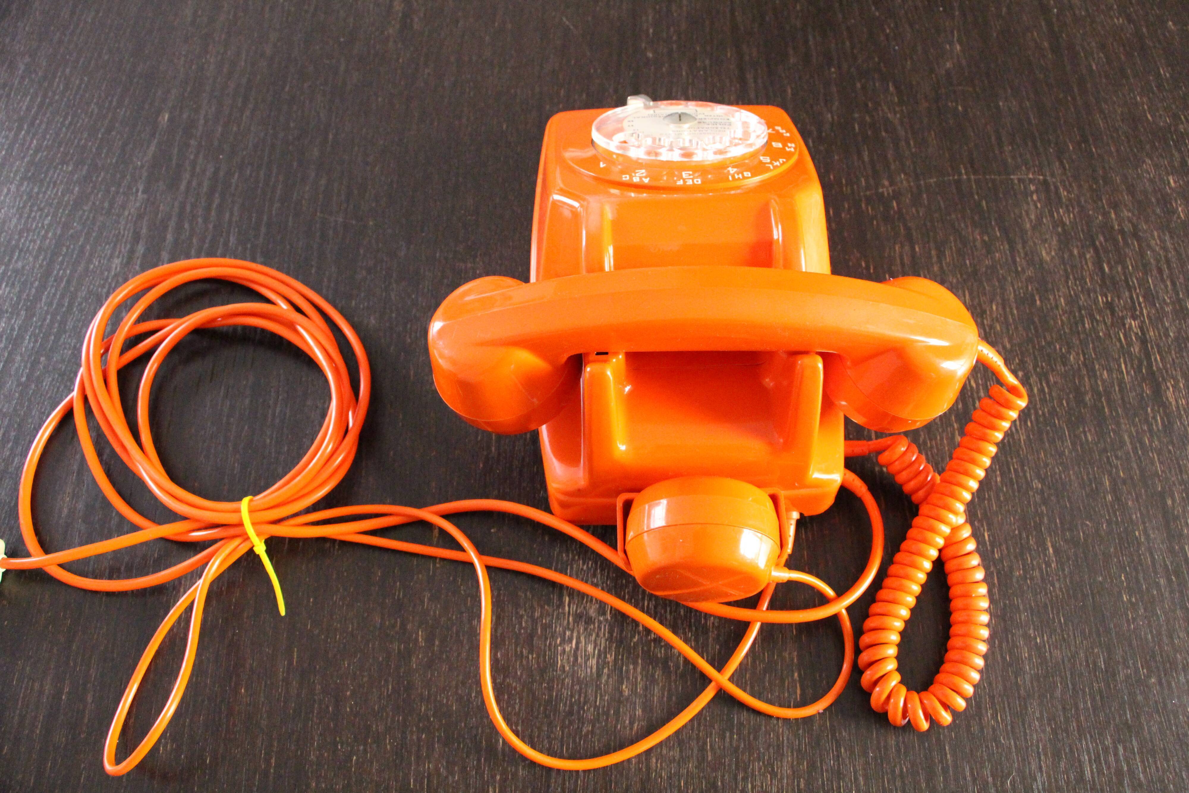 Vintage phone with orange dial 70's