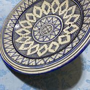 Moroccan dish in handcrafted sculpted ceramic, blue geometric patterns and