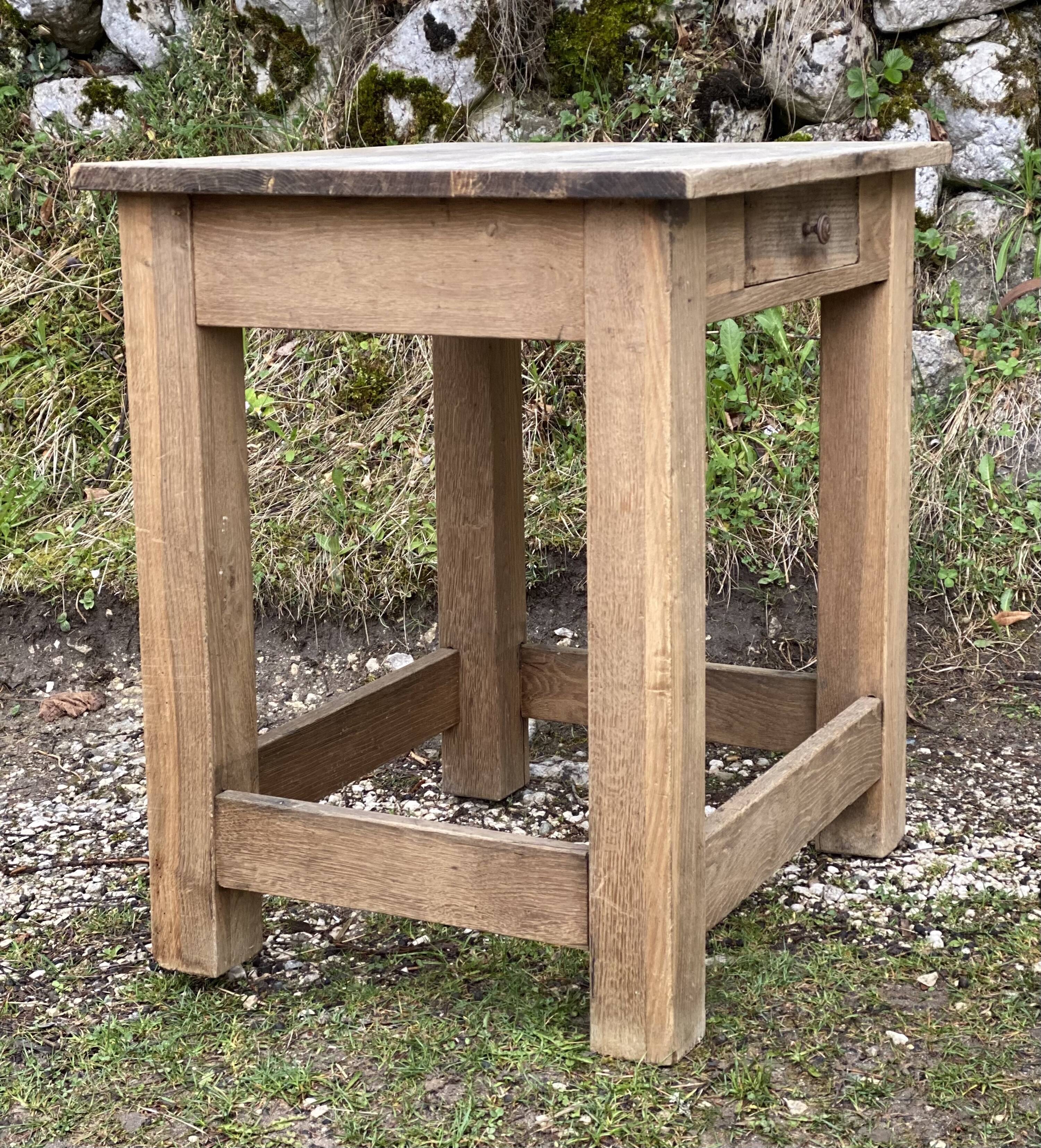 Brutalist table with 1 drawer, stripped oak.